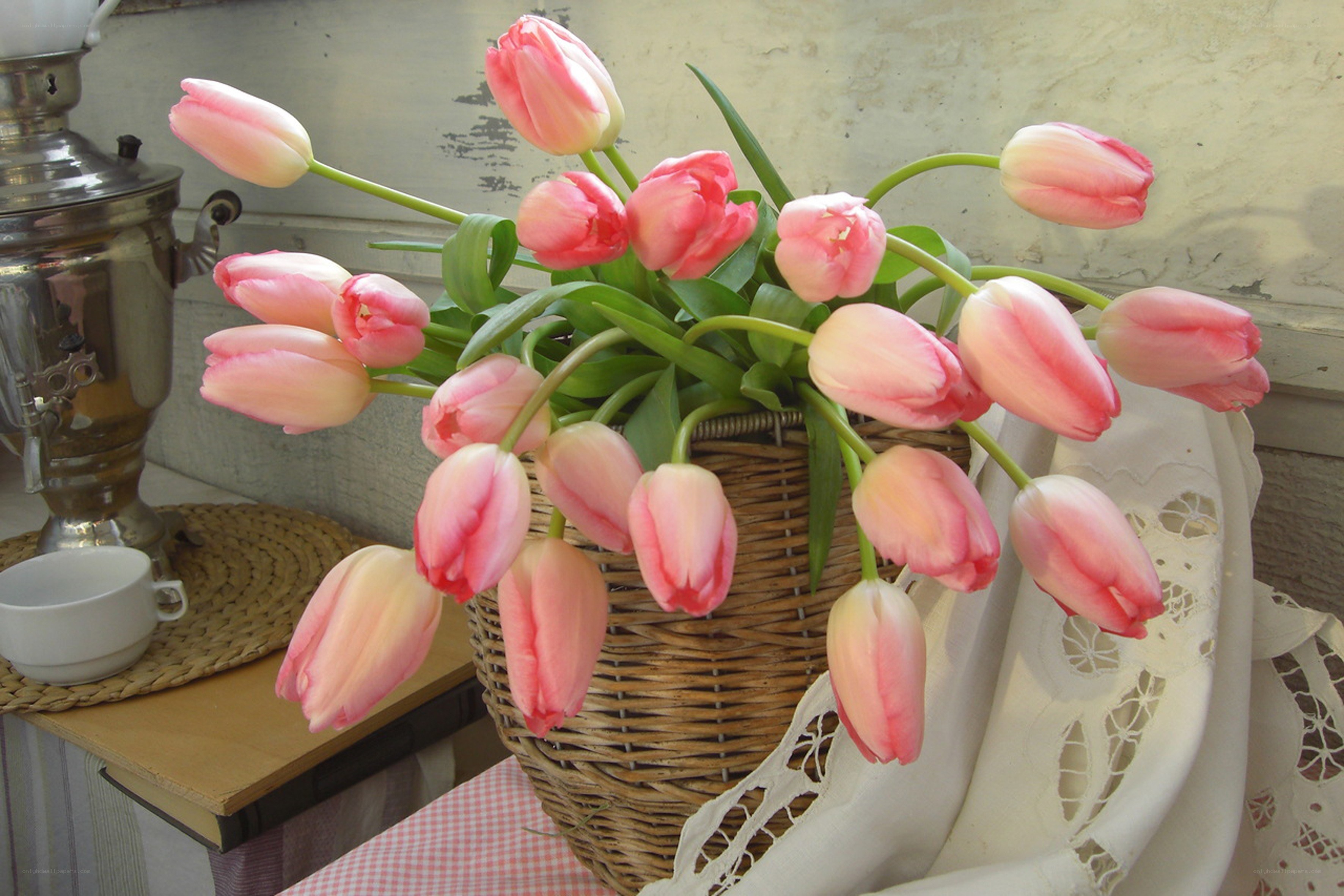 Pink tulips in a wicker basket
