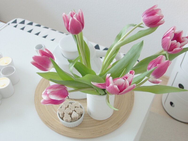 Pink tulips on a table