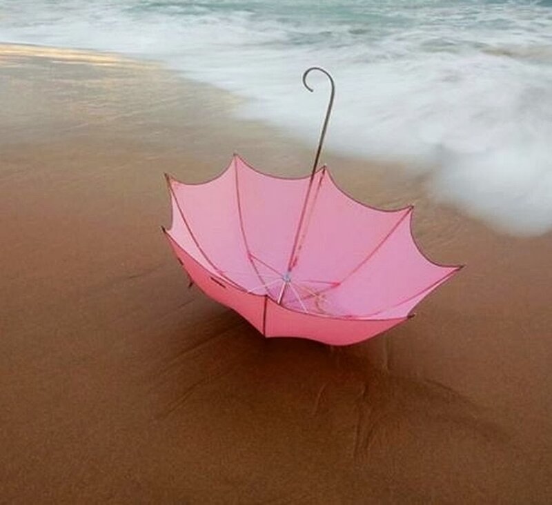 Pink Umbrella on Beach — Serene, Sunset