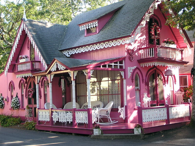 pink victorian house with porch