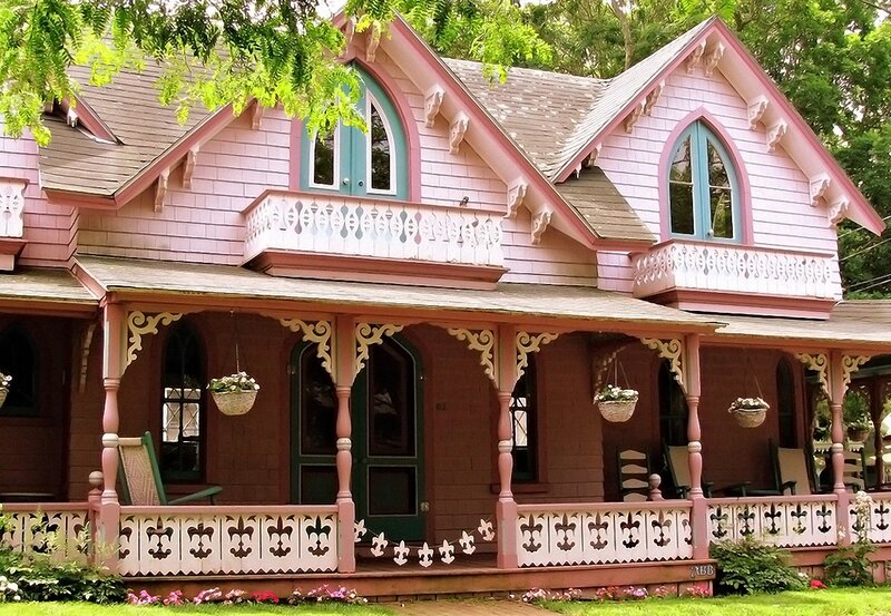 pink victorian house with porch
