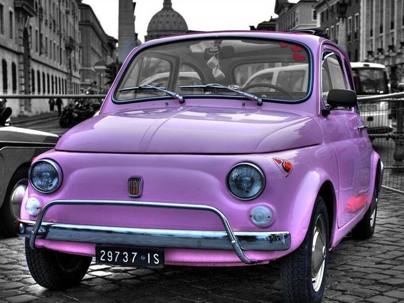 Pink vintage Fiat car