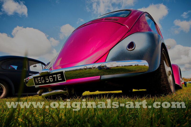 Pink VW Beetle at a car show