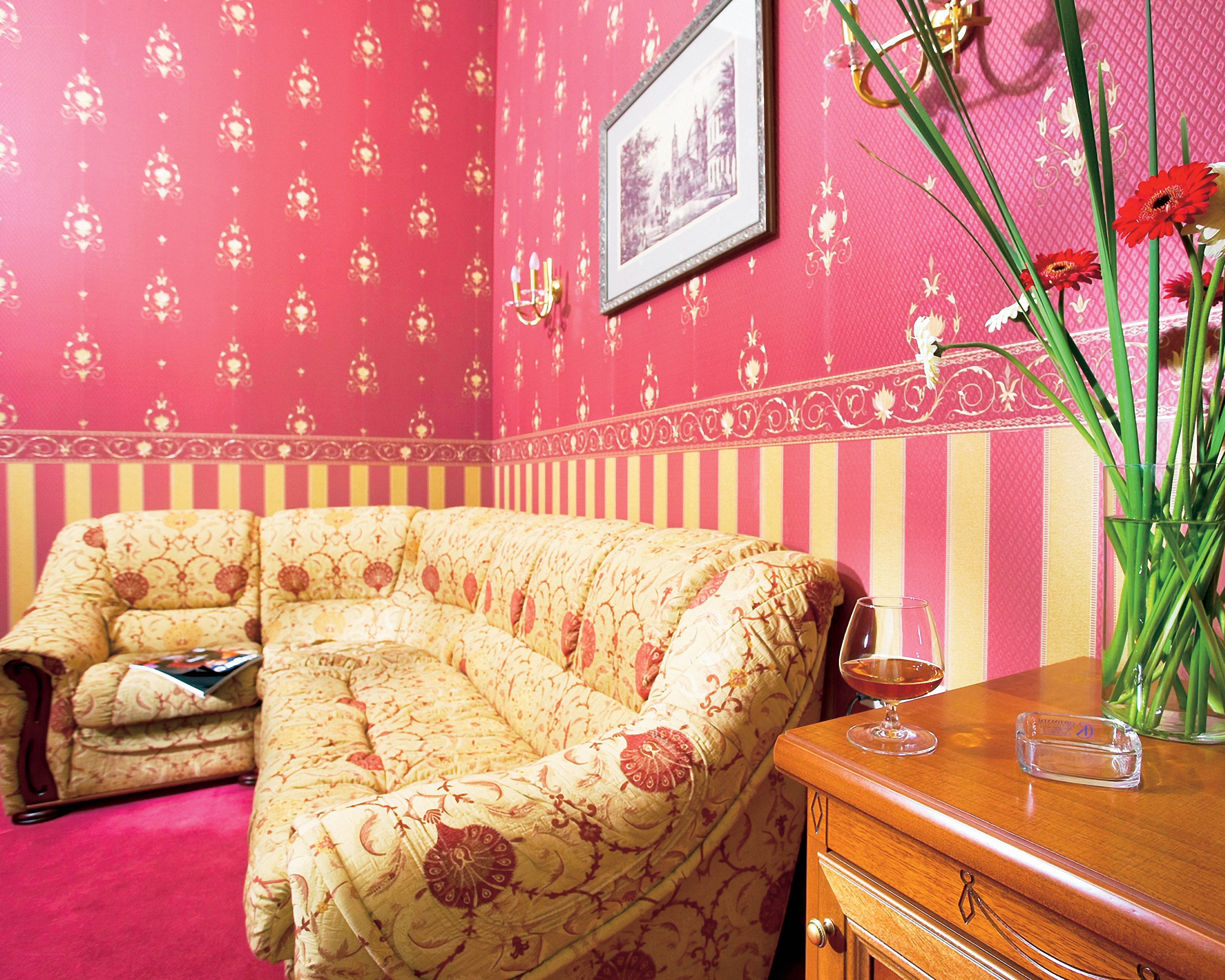 Pink-walled living room corner
