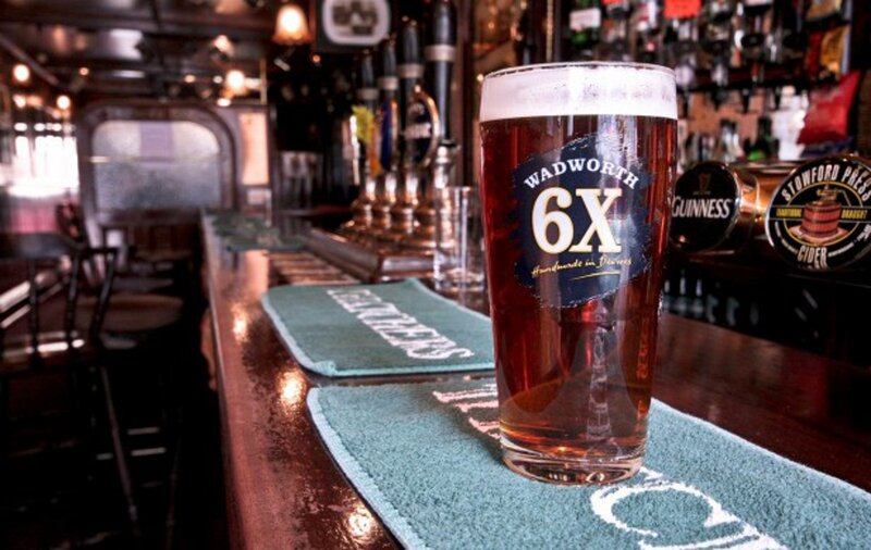 Pint of beer on bar counter