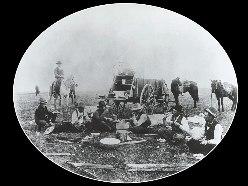 Pioneers having a meal