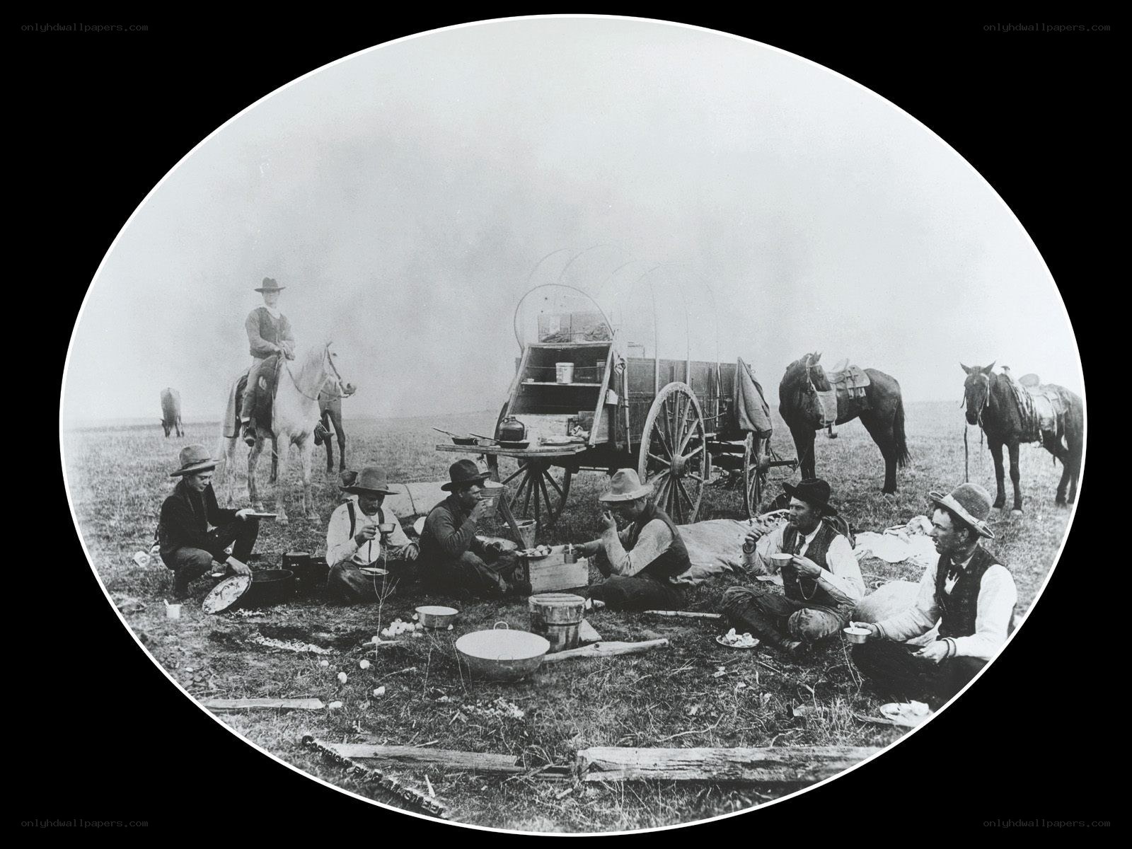 Pioneers having a meal