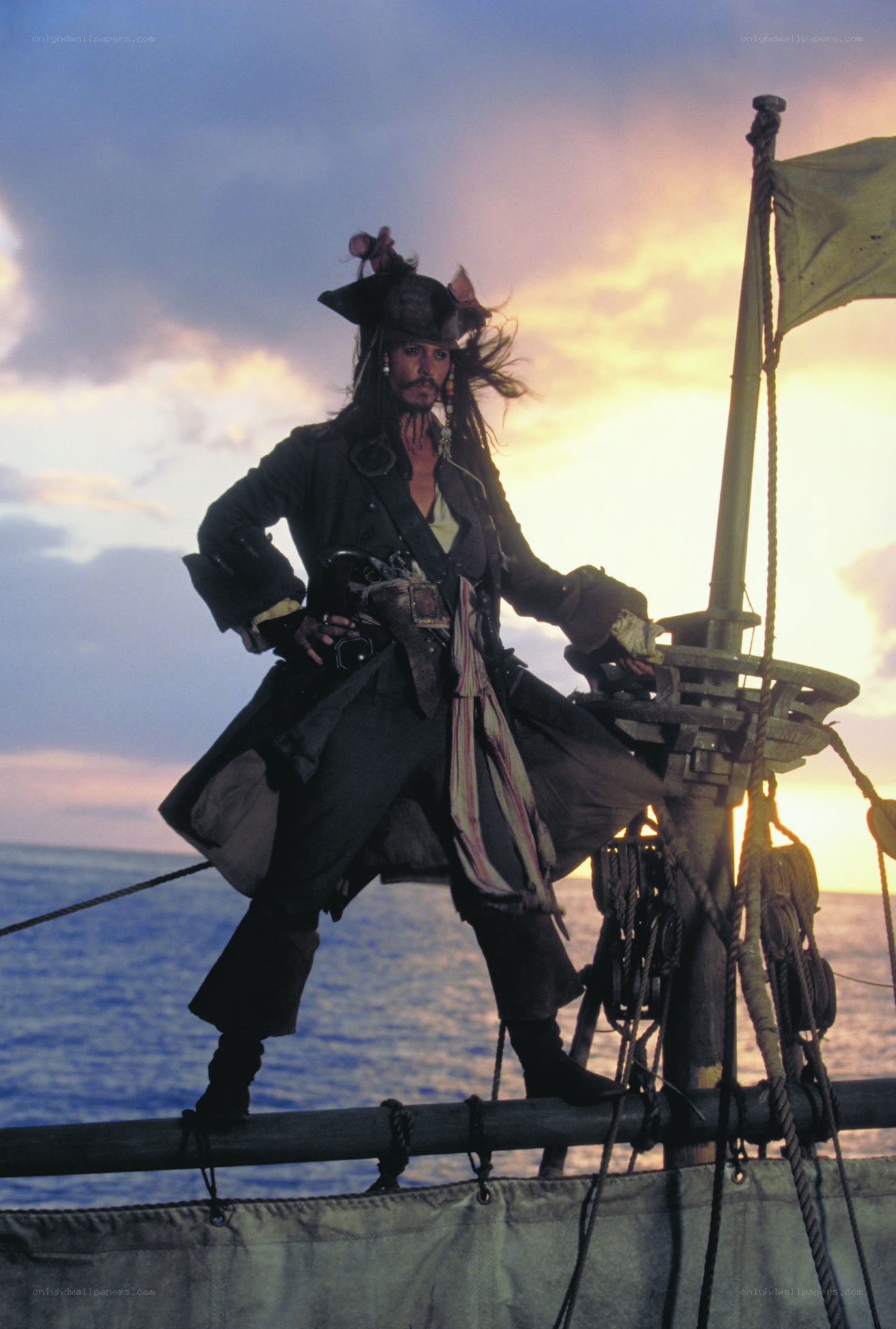Pirate on a ship at sunset