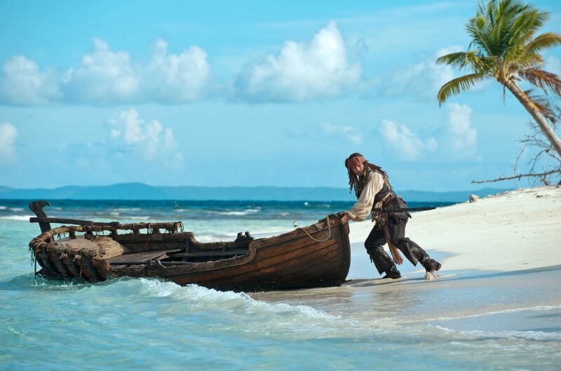 Pirate Pushing Boat — Blue, Dramatic, Afternoon, Photograph, Palm Tree