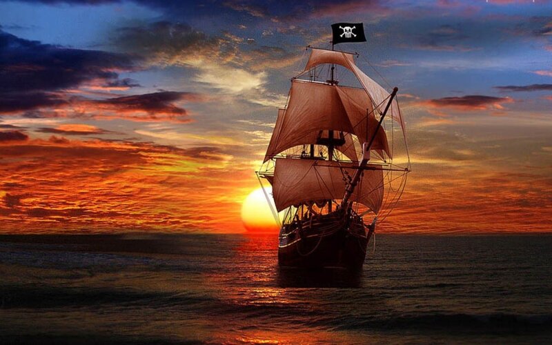 Pirate Ship at Sunset — Orange, Dramatic, Photograph