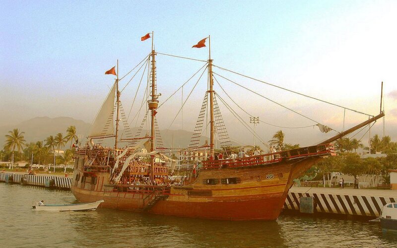 Pirate ship docked at harbor