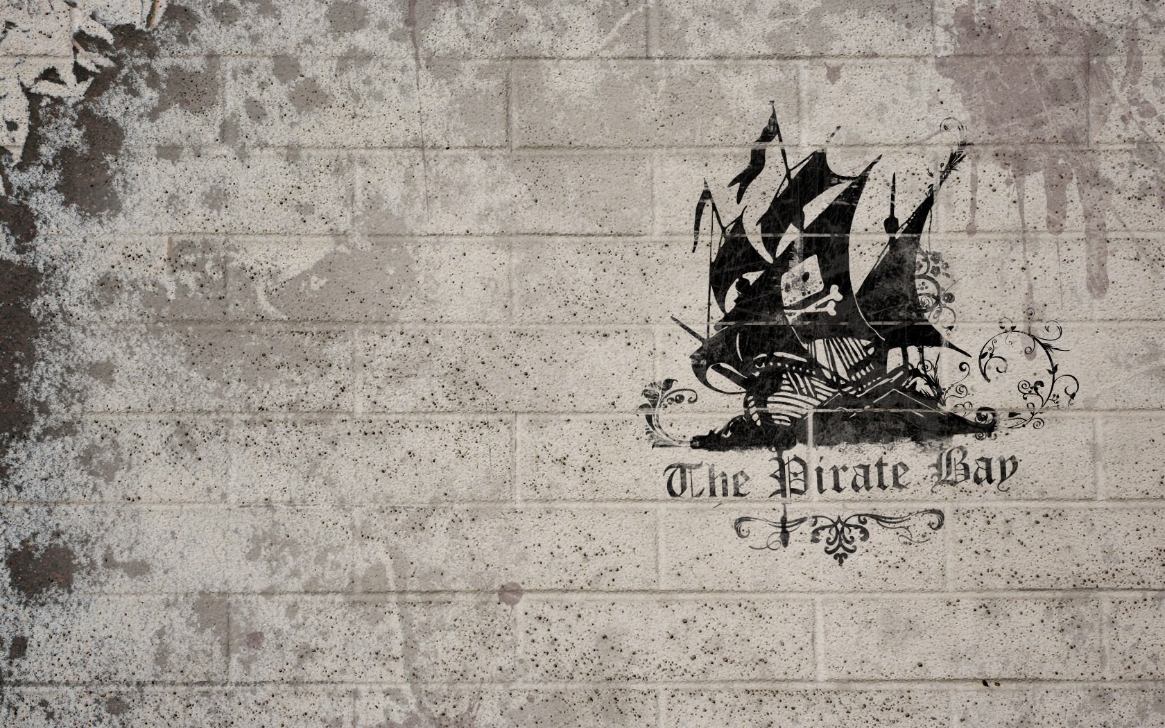 pirate ship graffiti on brick wall