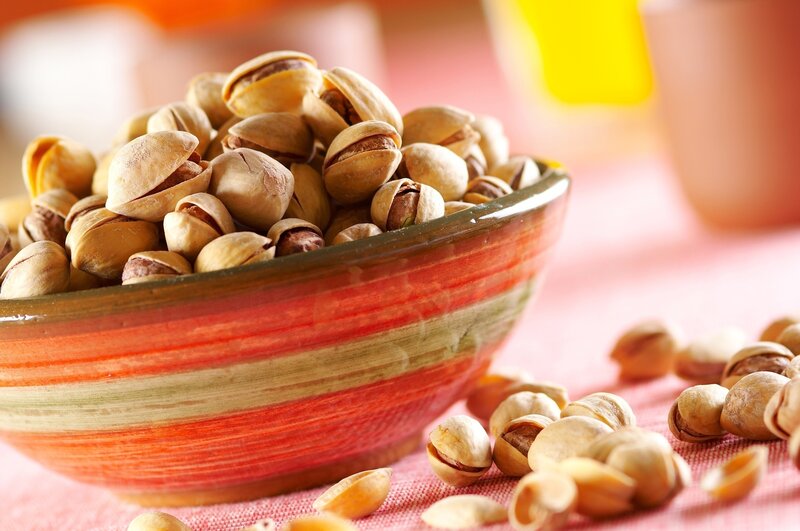 Pistachios in a colorful bowl