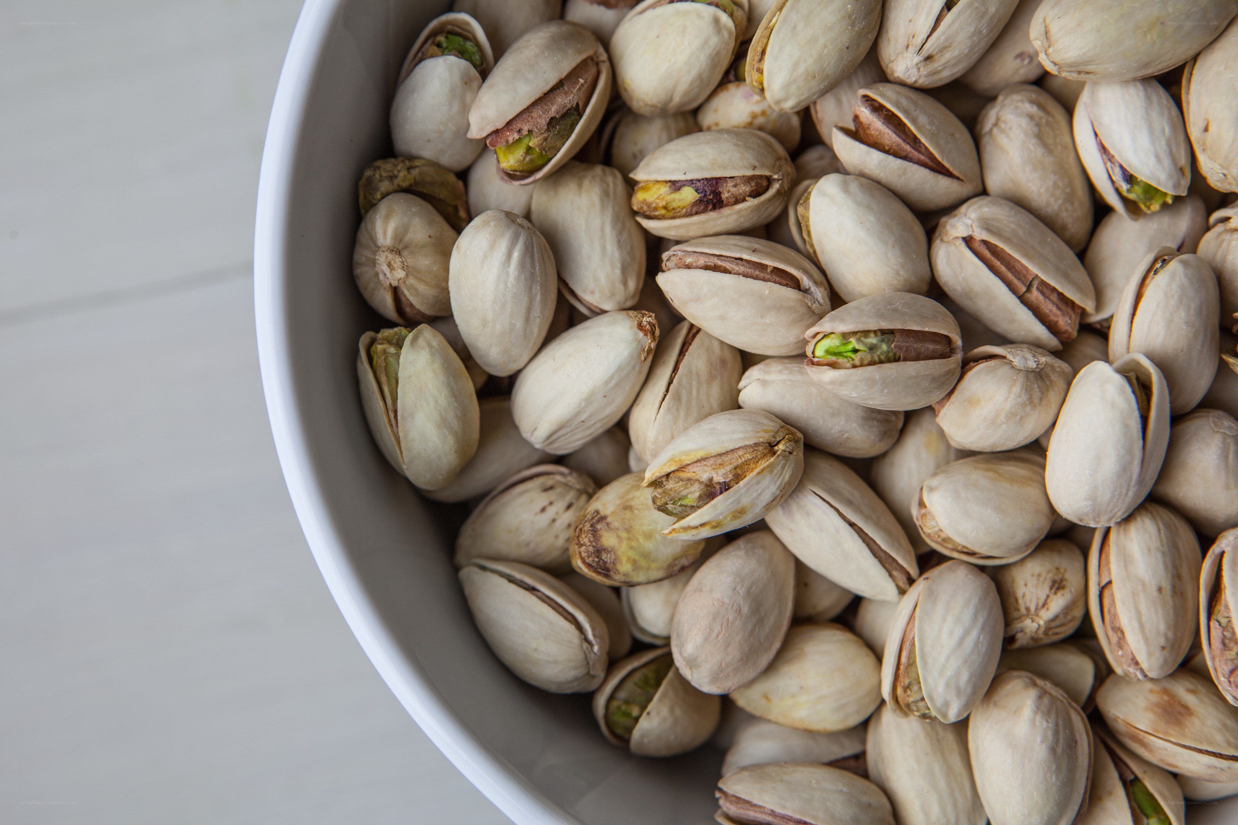 pistachios in a white bowl