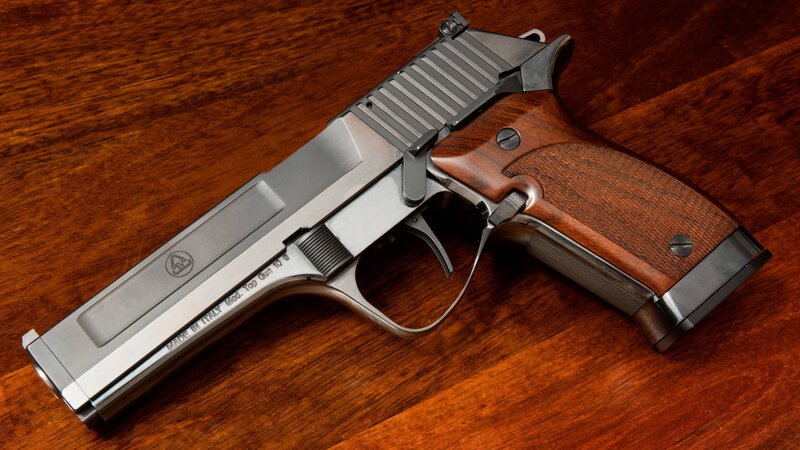 Pistol on Wooden Surface — Brown, Neutral