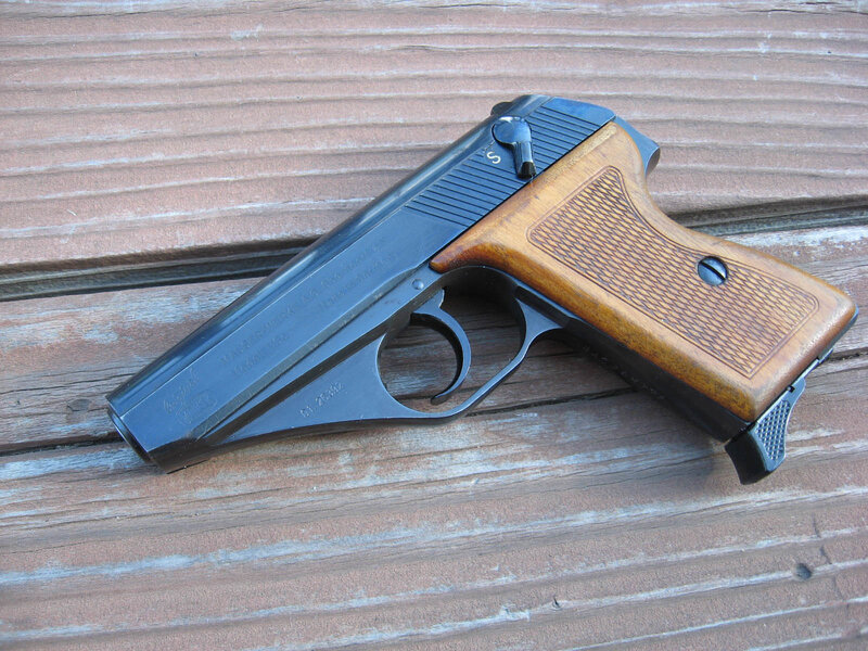 pistol on wooden surface