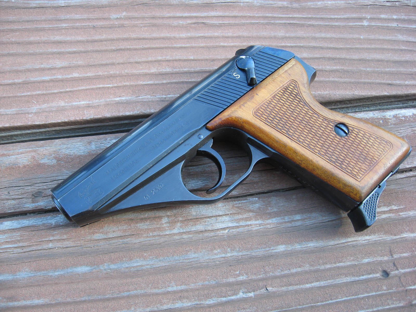 pistol on wooden surface
