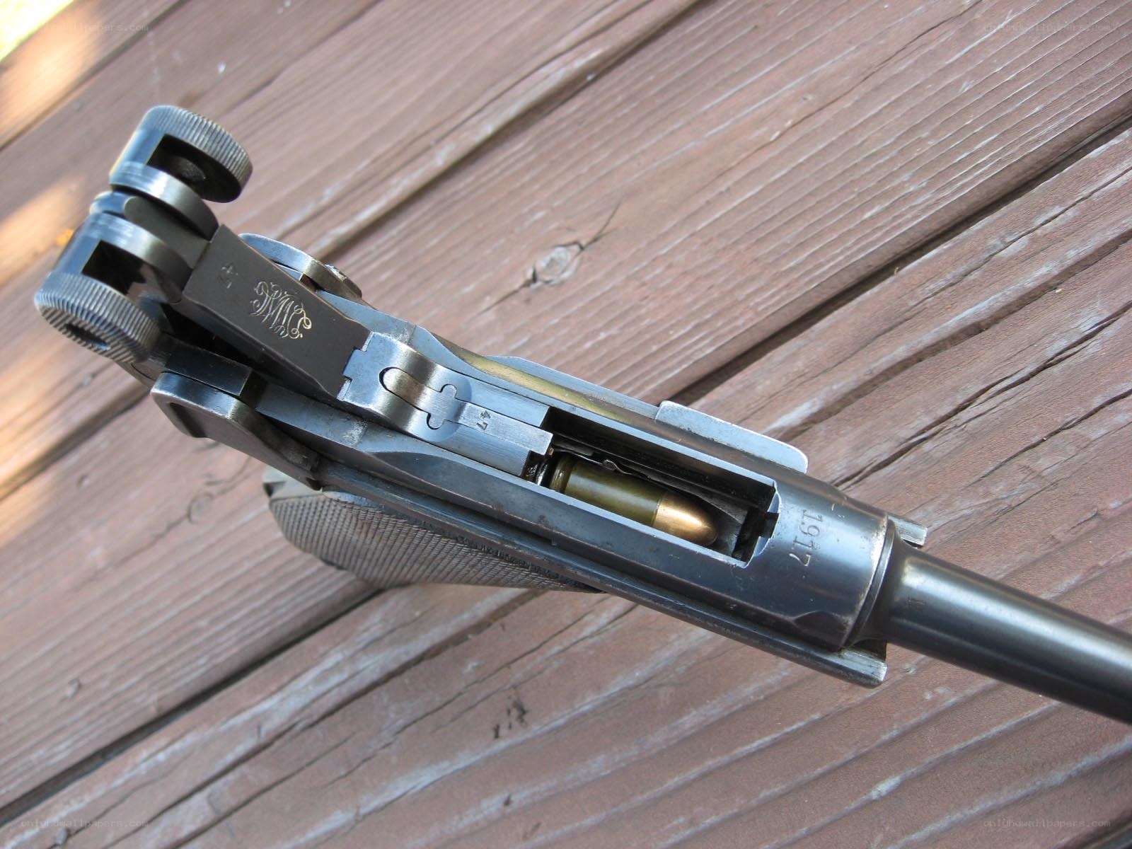 pistol with bullet in chamber