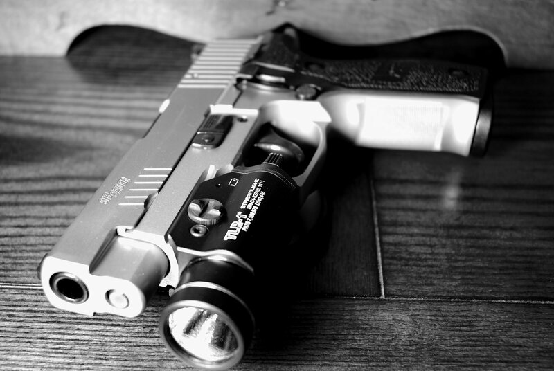 pistol with flashlight attachment