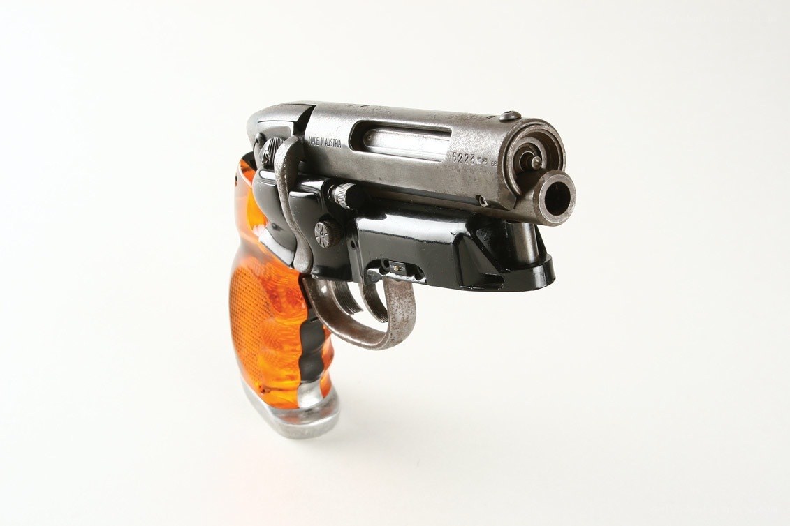 pistol with orange grip