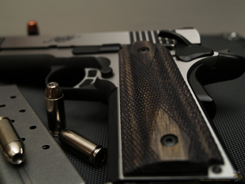 pistol with wooden grips