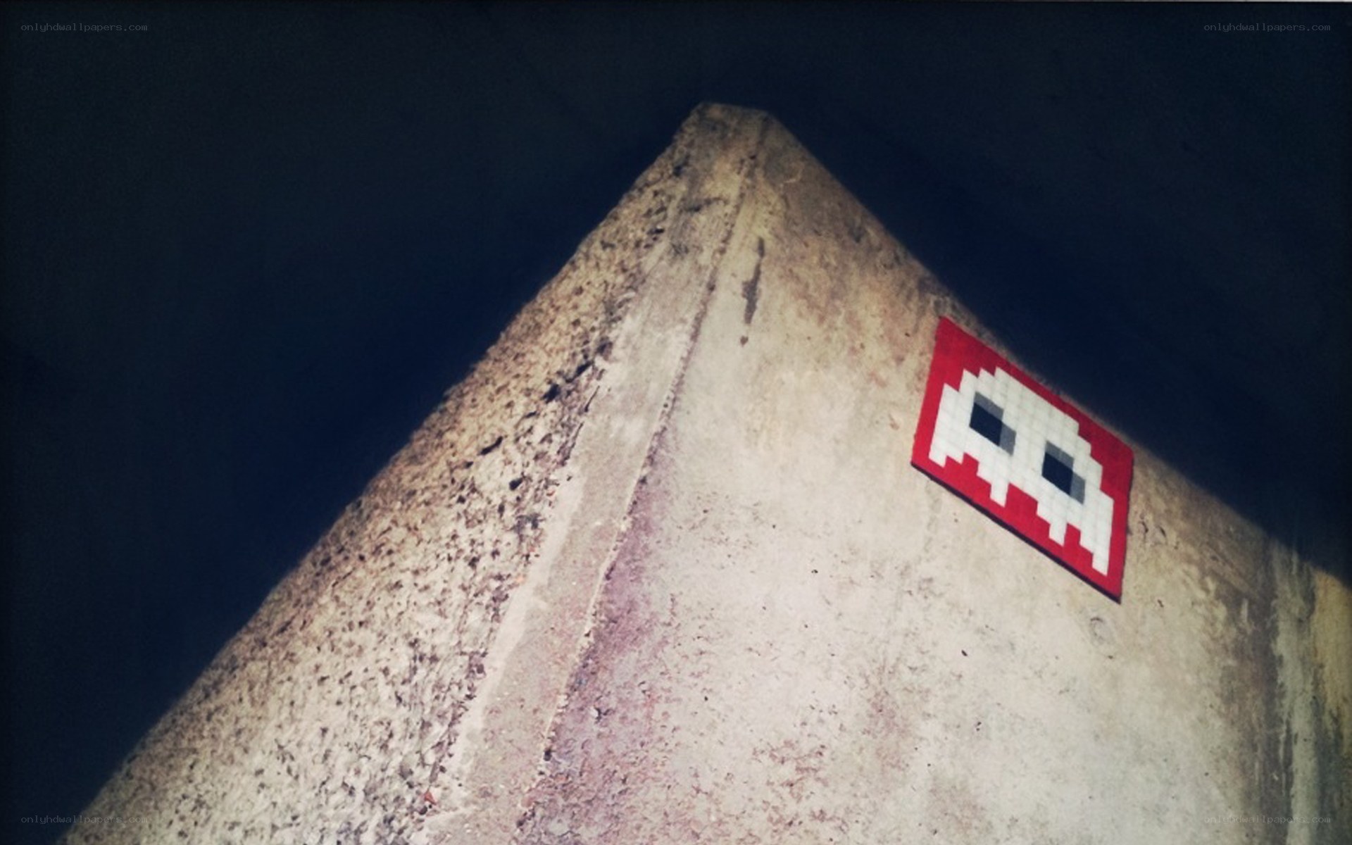 pixel art alien on concrete