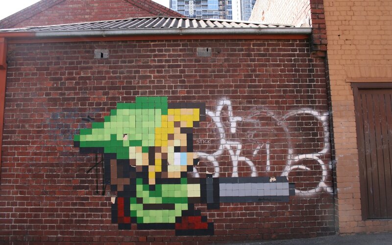 pixel art of link on brick wall