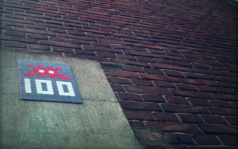 pixel art on brick wall