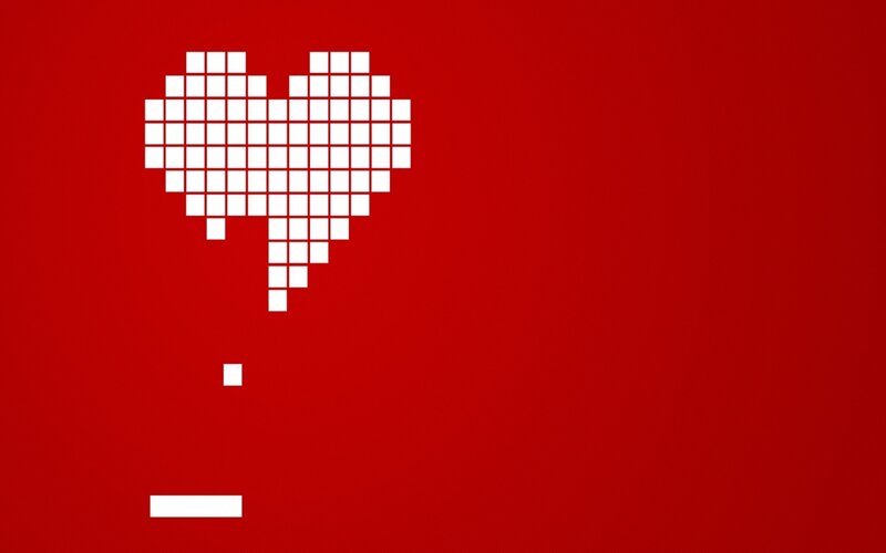 pixel heart on red background