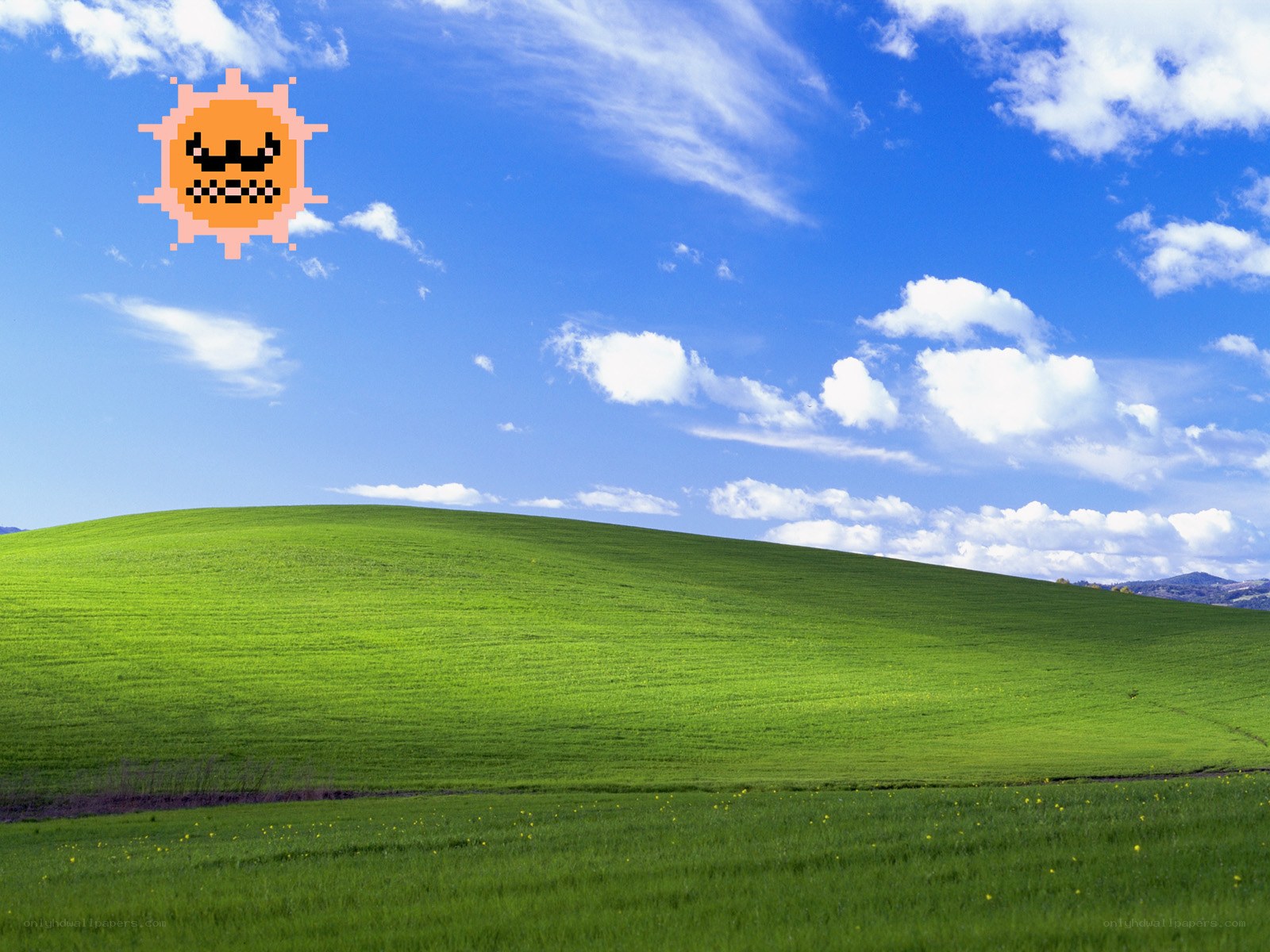 Pixel sun over green hills