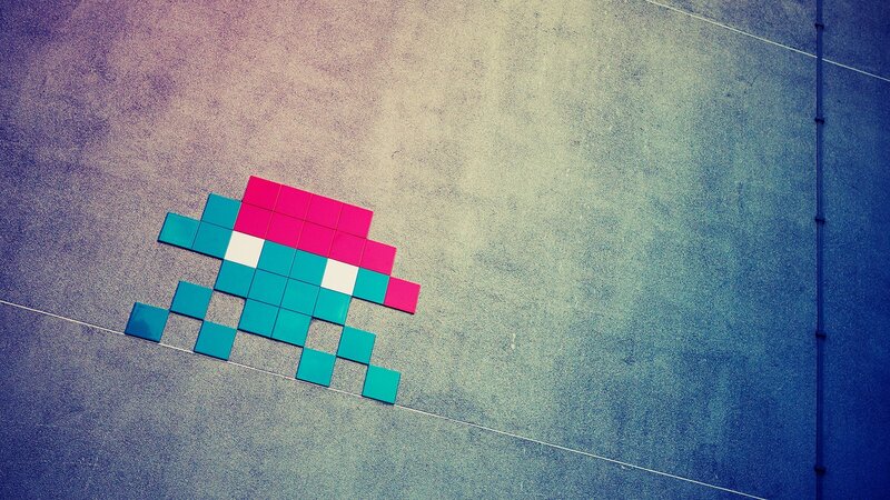 Pixelated Alien Figure — Teal