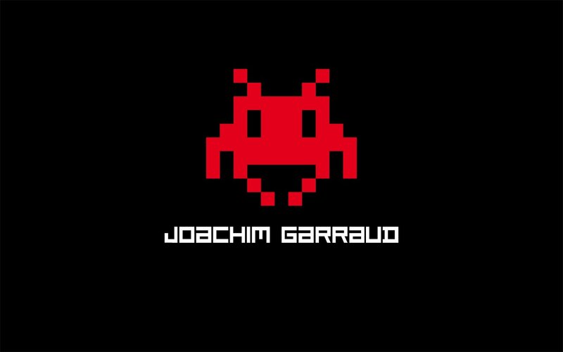 pixelated alien logo