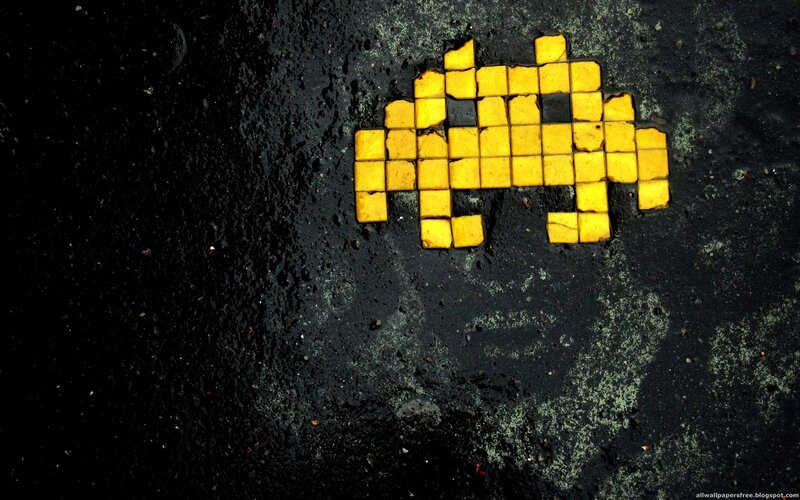 Pixelated alien on wet pavement