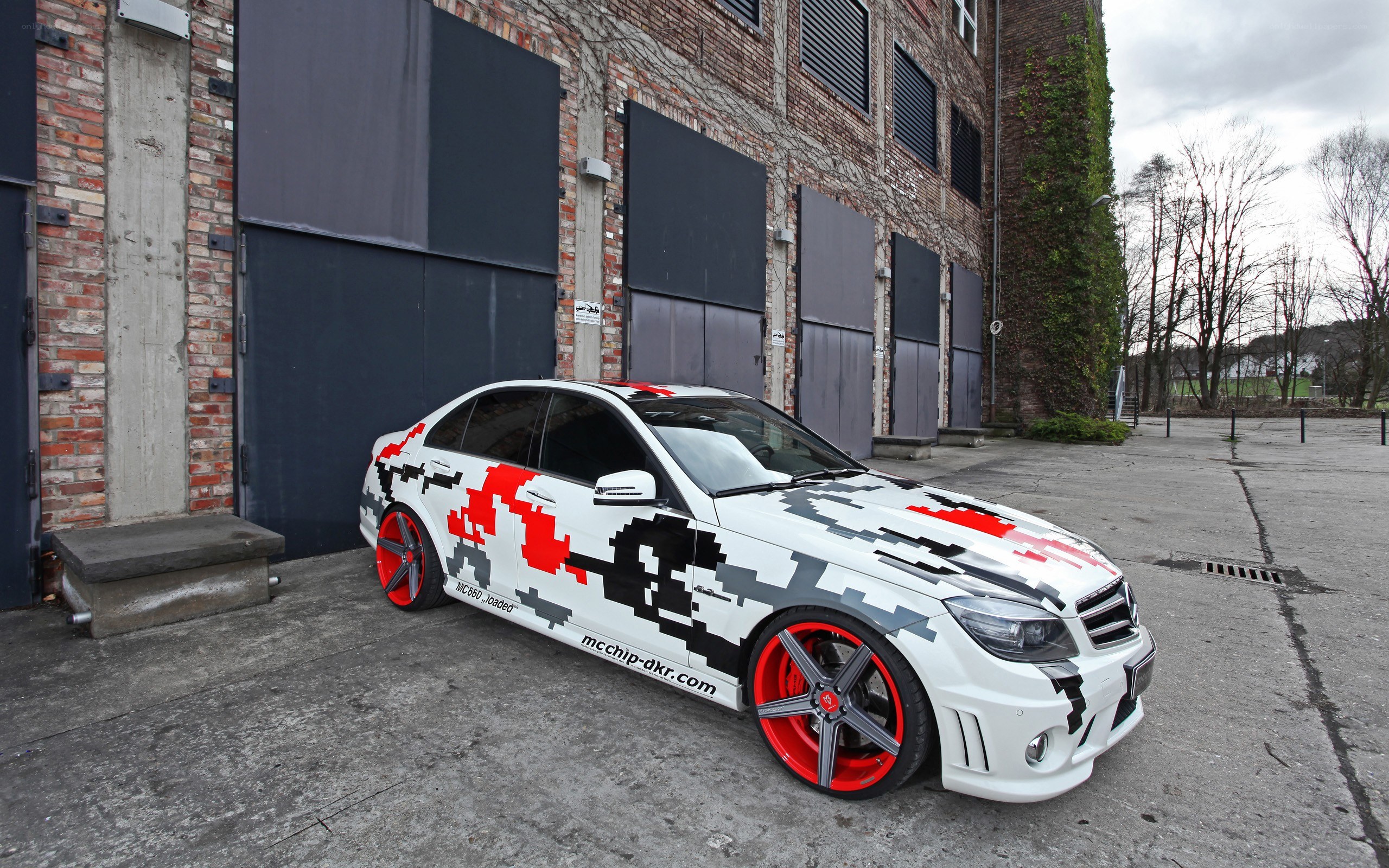 pixelated car in industrial area