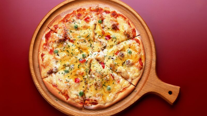 pizza on wooden board