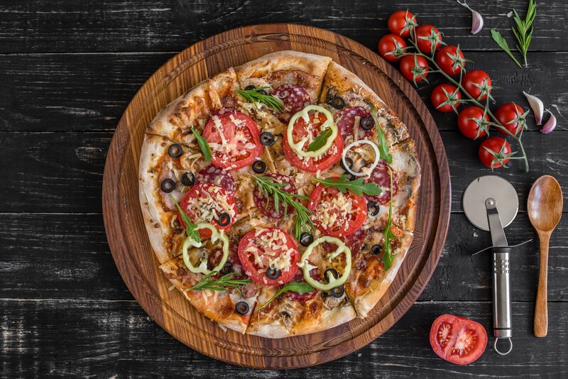 Pizza on Wooden Board — Brown, Appetizing, Photograph, Tomatoes, Olives
