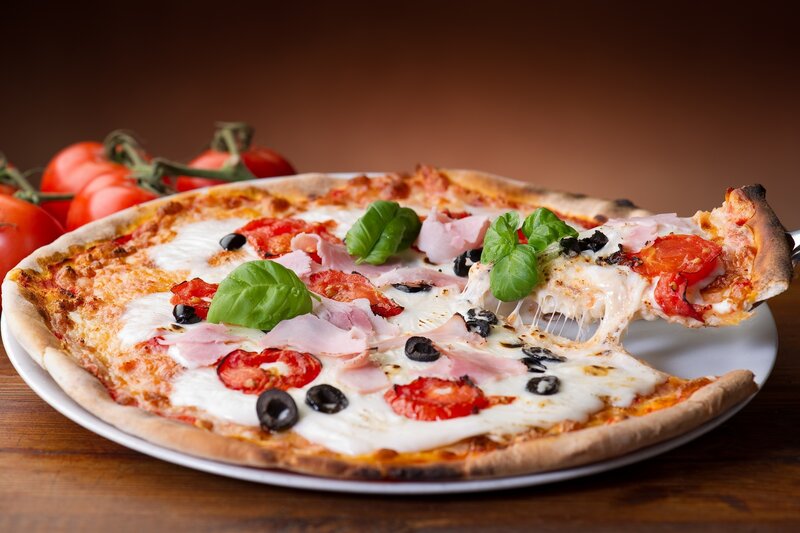 pizza with ham and basil