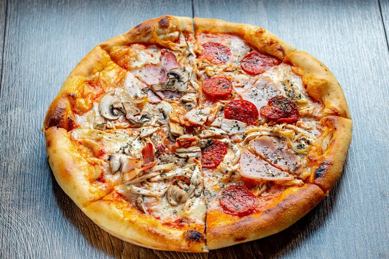 Pizza with Multiple Toppings — Brown