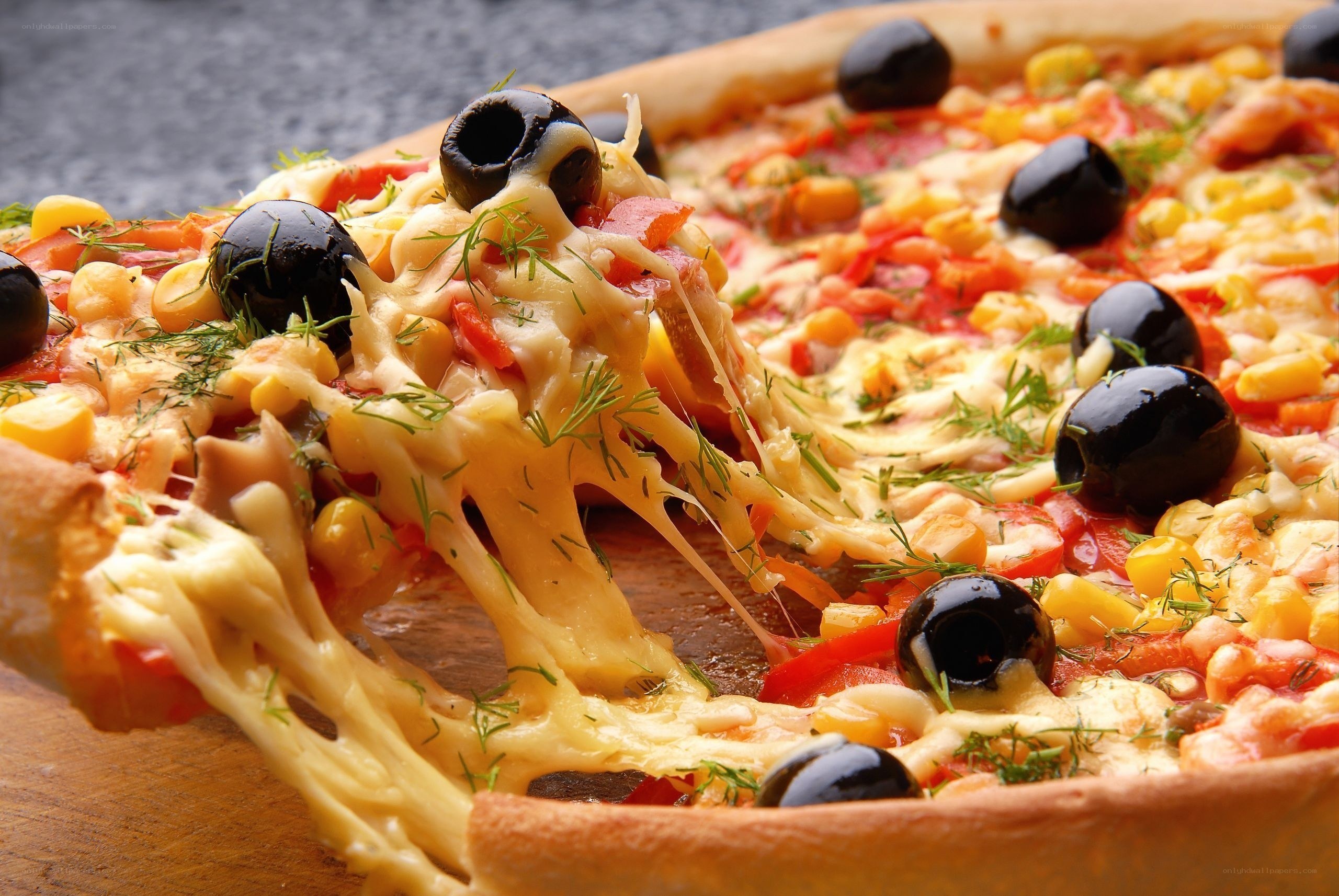 pizza with olives and corn