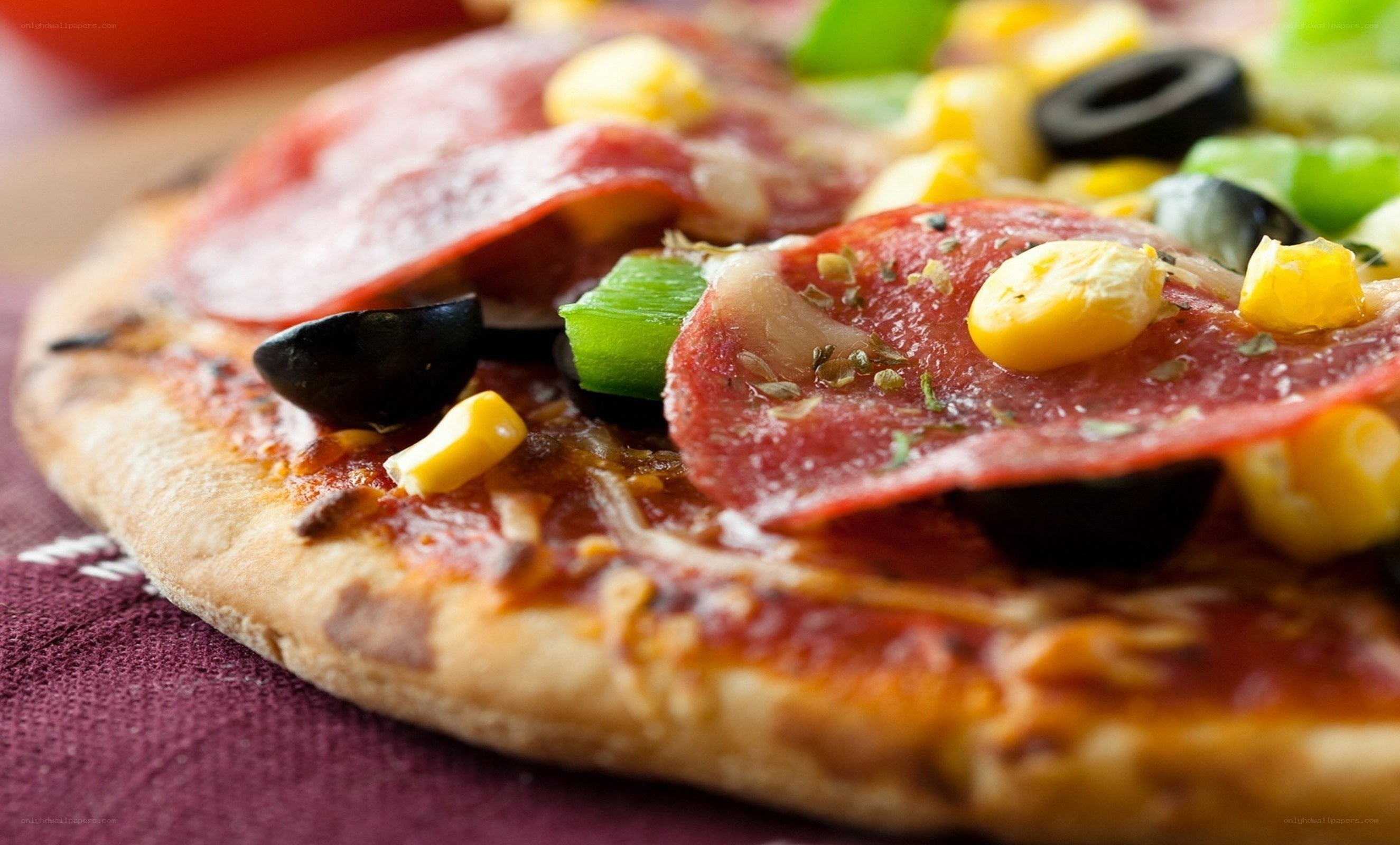 pizza with salami and vegetables