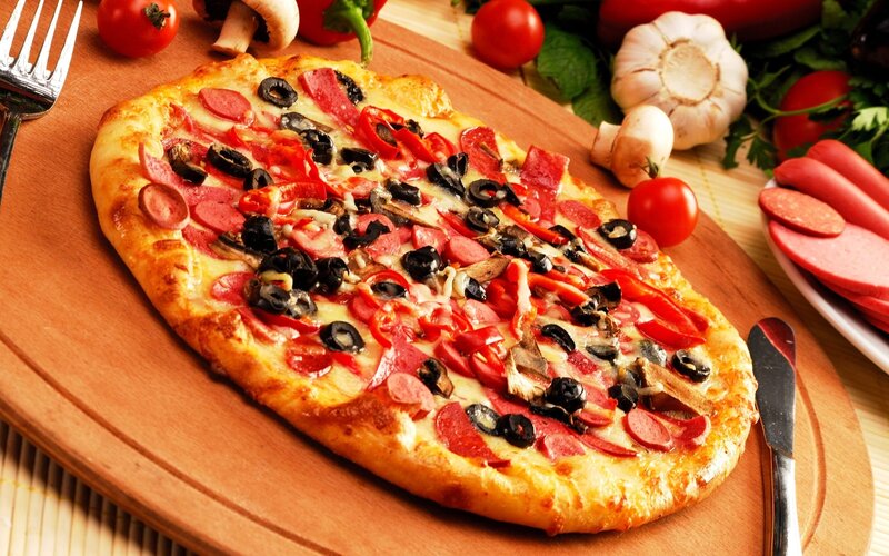 Pizza with Toppings — Brown