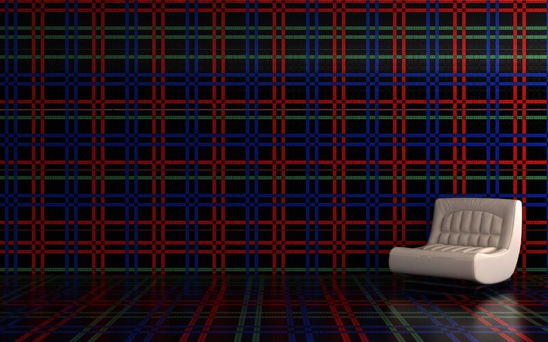 plaid wall with white chair