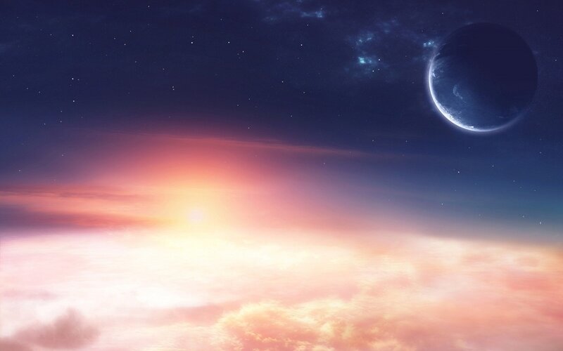 Planet and Sun over Clouds