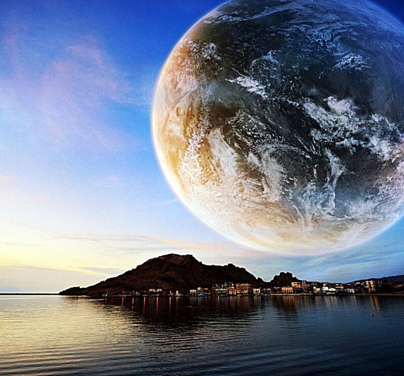 Planet looming over coastal town