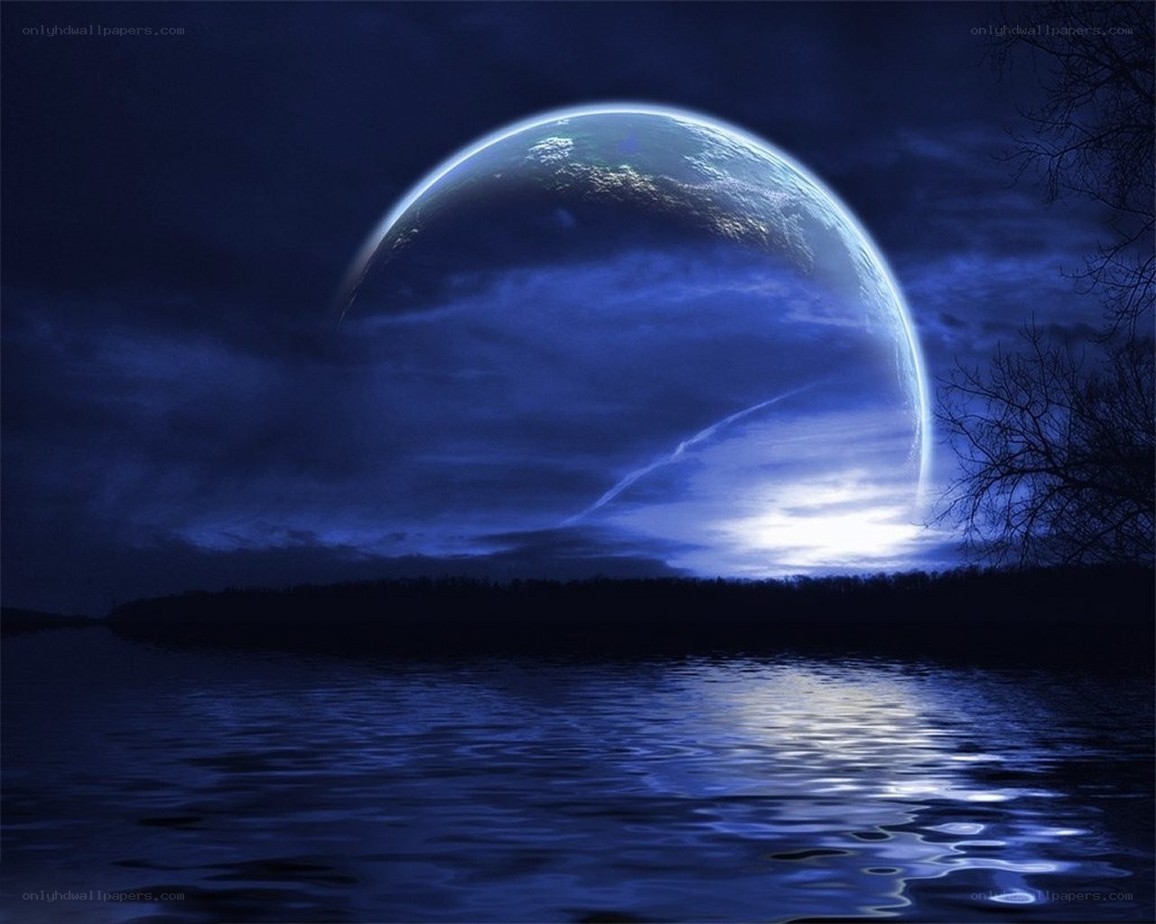 Planet over a lake at night