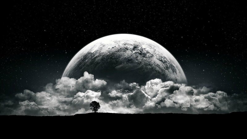 Planet over a lone tree