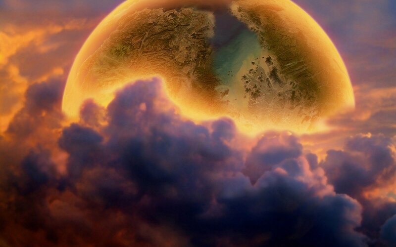 planet rising above clouds