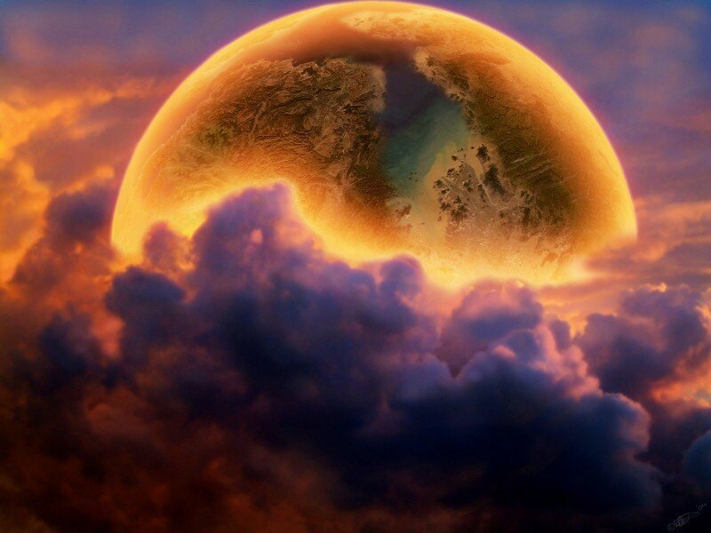 Planet rising above clouds
