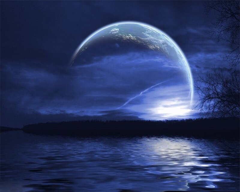 Planet rising over a lake