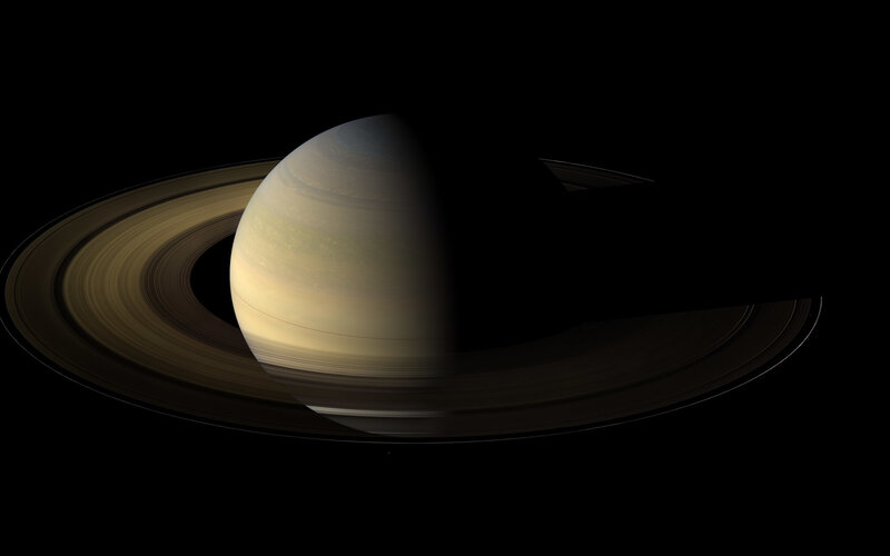 Planet Saturn with Rings — Black, Dramatic